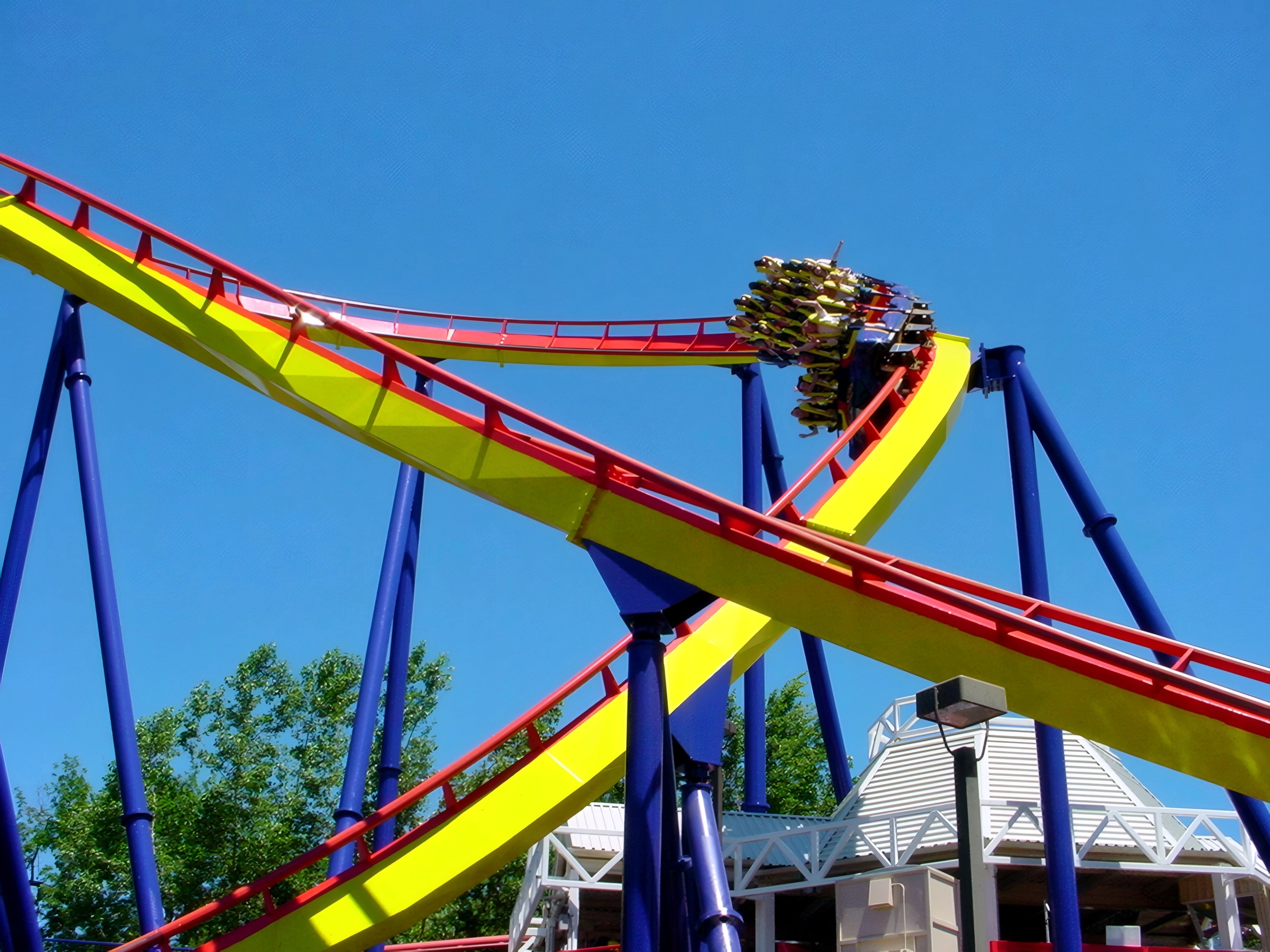 Mantis train on the inclined loop above the midway, Mantis at Cedar Point