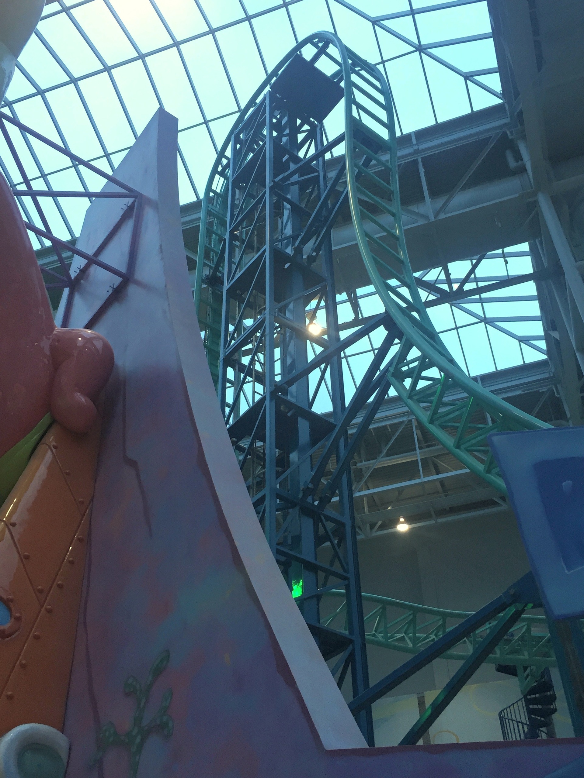 The SpongeBob SquarePants Rock Bottom Plunge's vertical lift and loops from the queue at Nickelodeon Universe, November 2015
