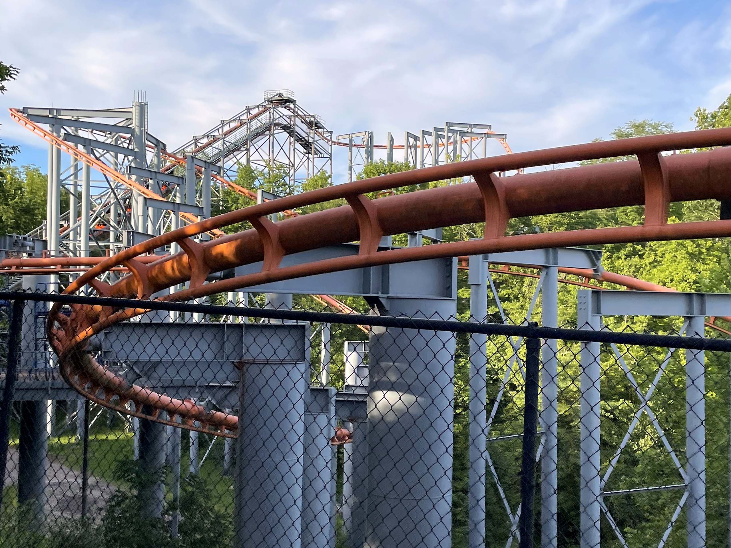 The Bat's curve with the lift structure behind it, Kings Island, July 2022