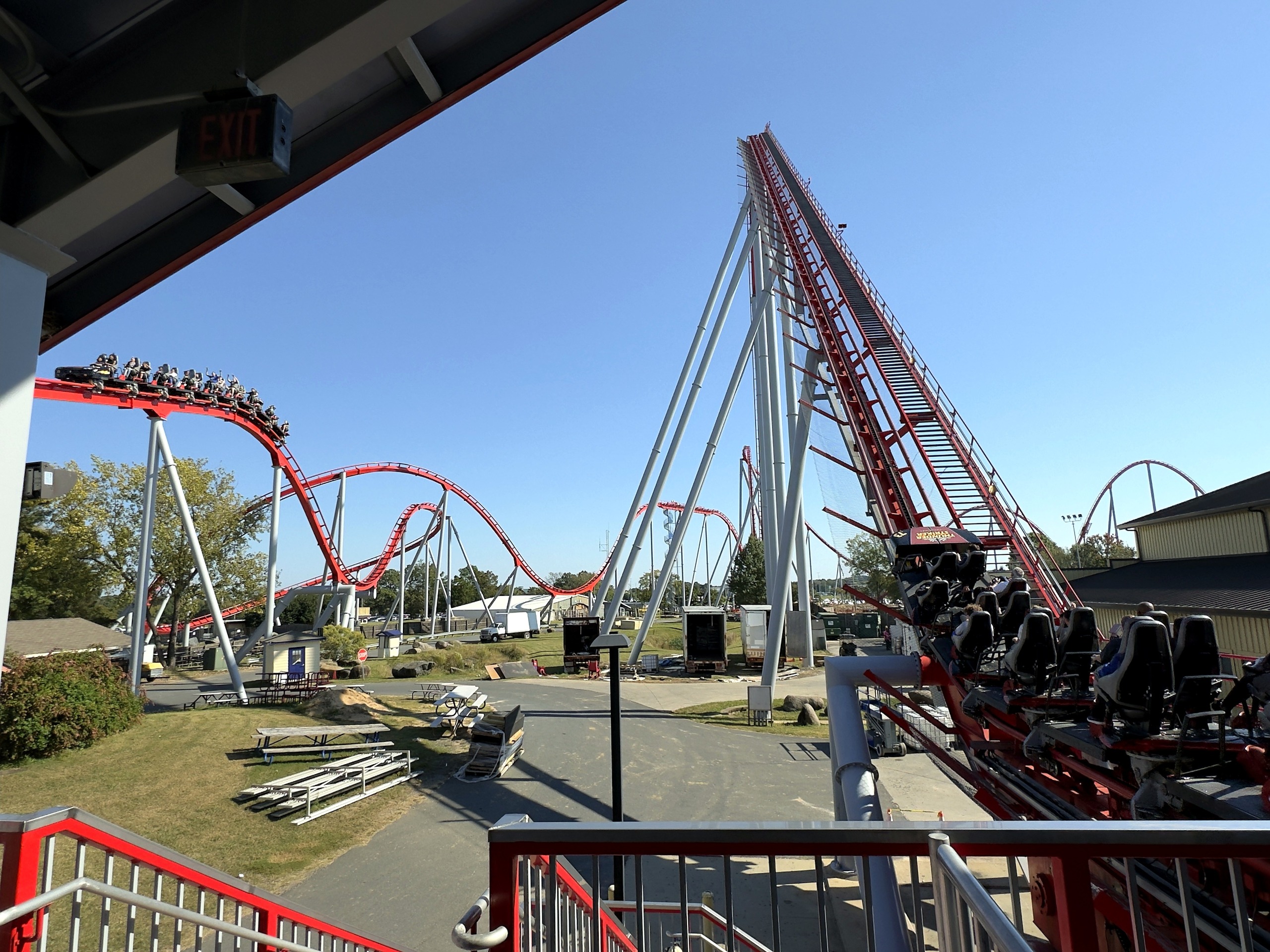 A Thunder Striker train leaving the station toward the lift hill at Carowinds, October 2024