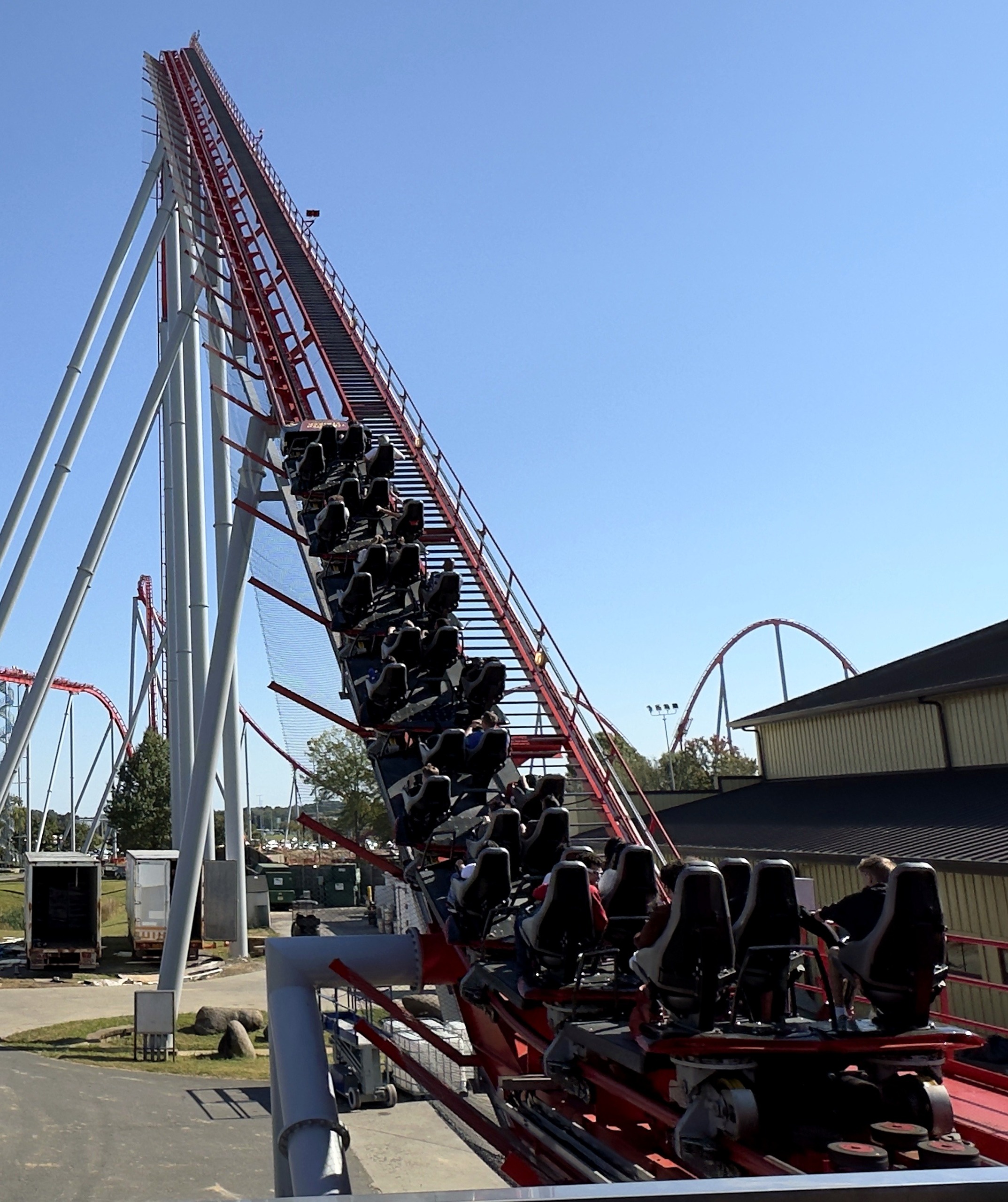 A Thunder Striker train starting up the red lift hill at Carowinds, October 2024