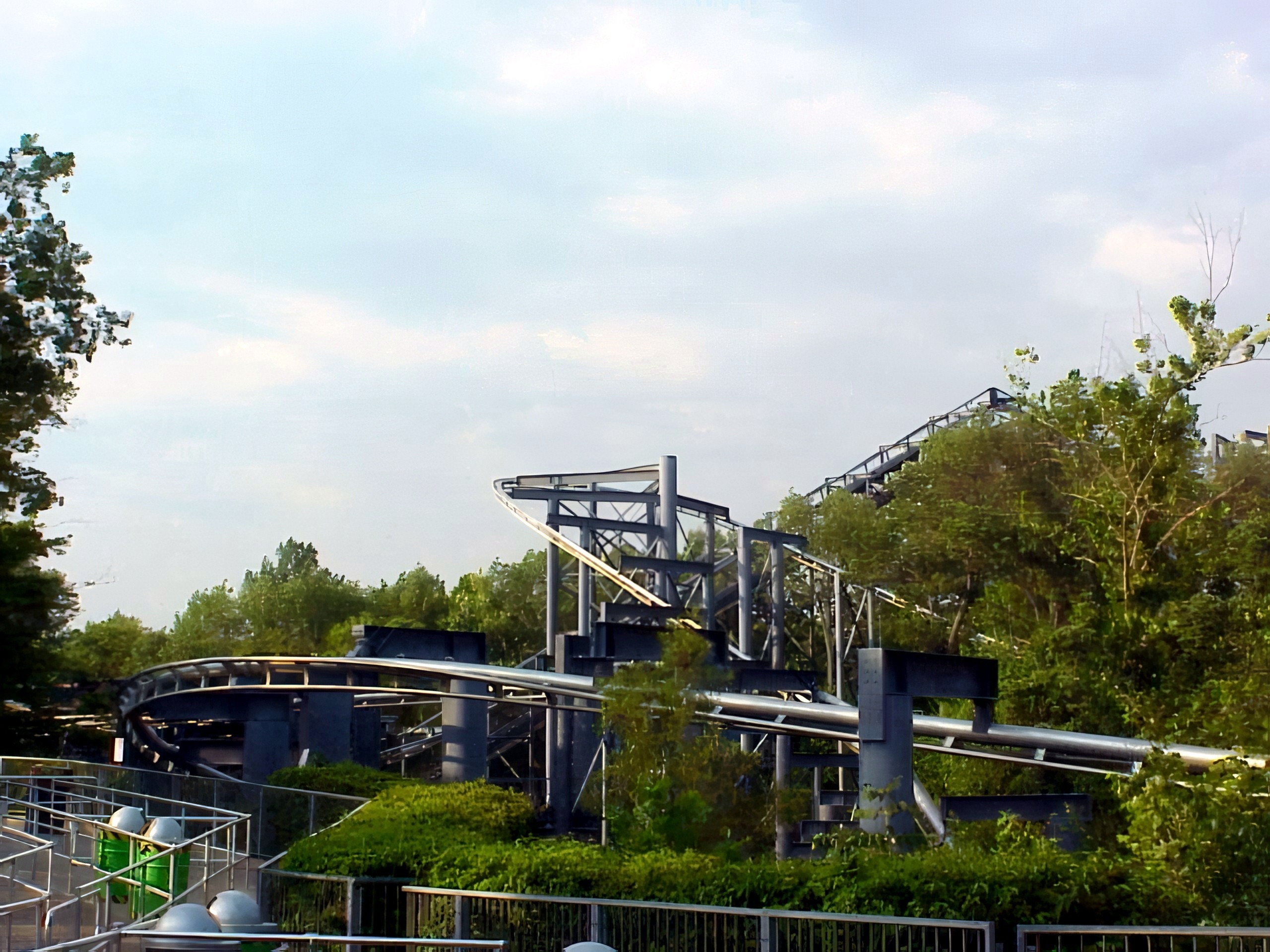 Top Gun's track and lift structure above the hedges at Paramount's Kings Island, August 2000