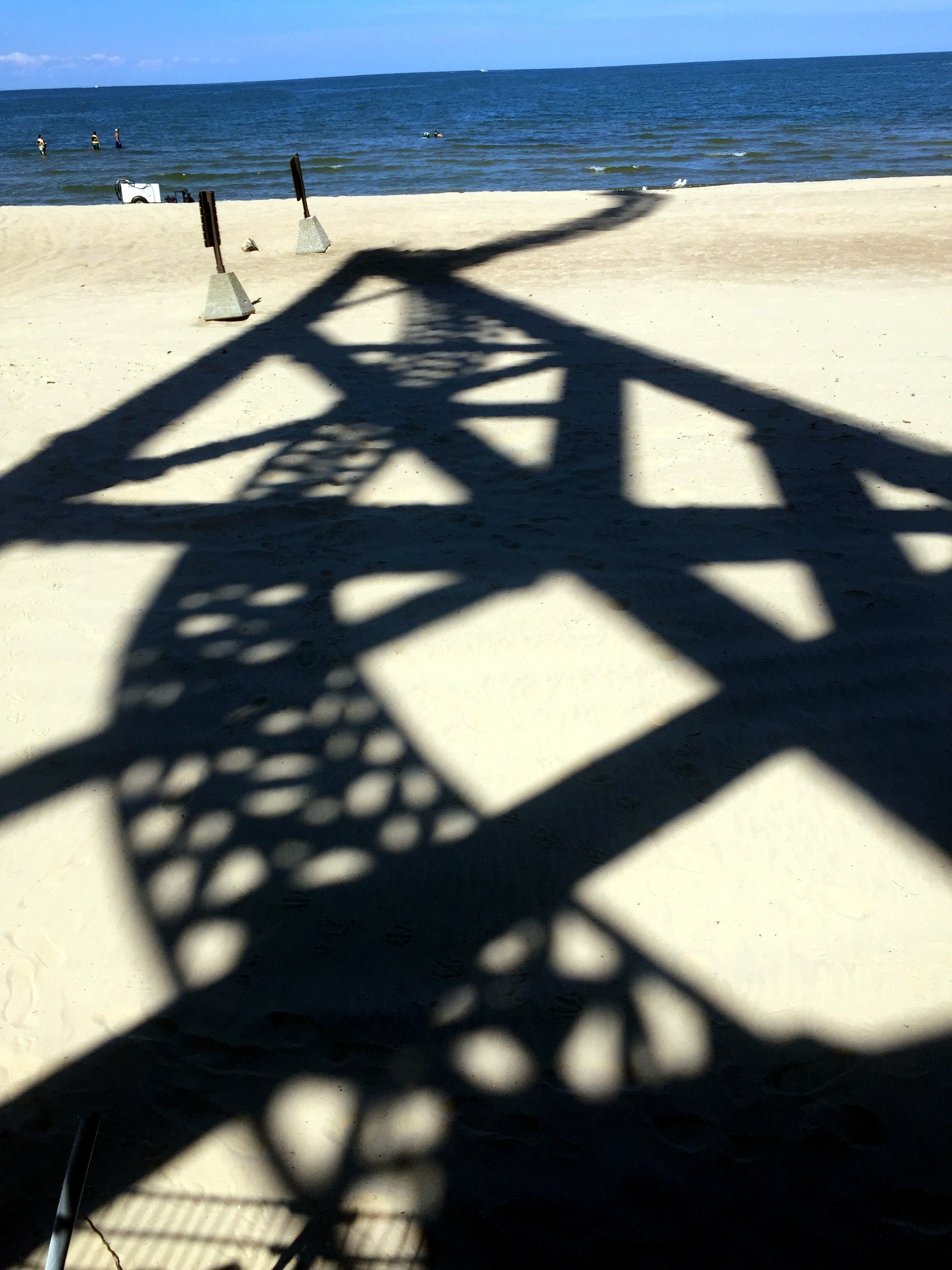 The shadow of Wicked Twister's structure on the Cedar Point beach by Lake Erie, July 2016